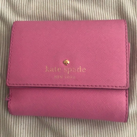 kate spade Handbags - Kate spade small bi fold wallet in pink